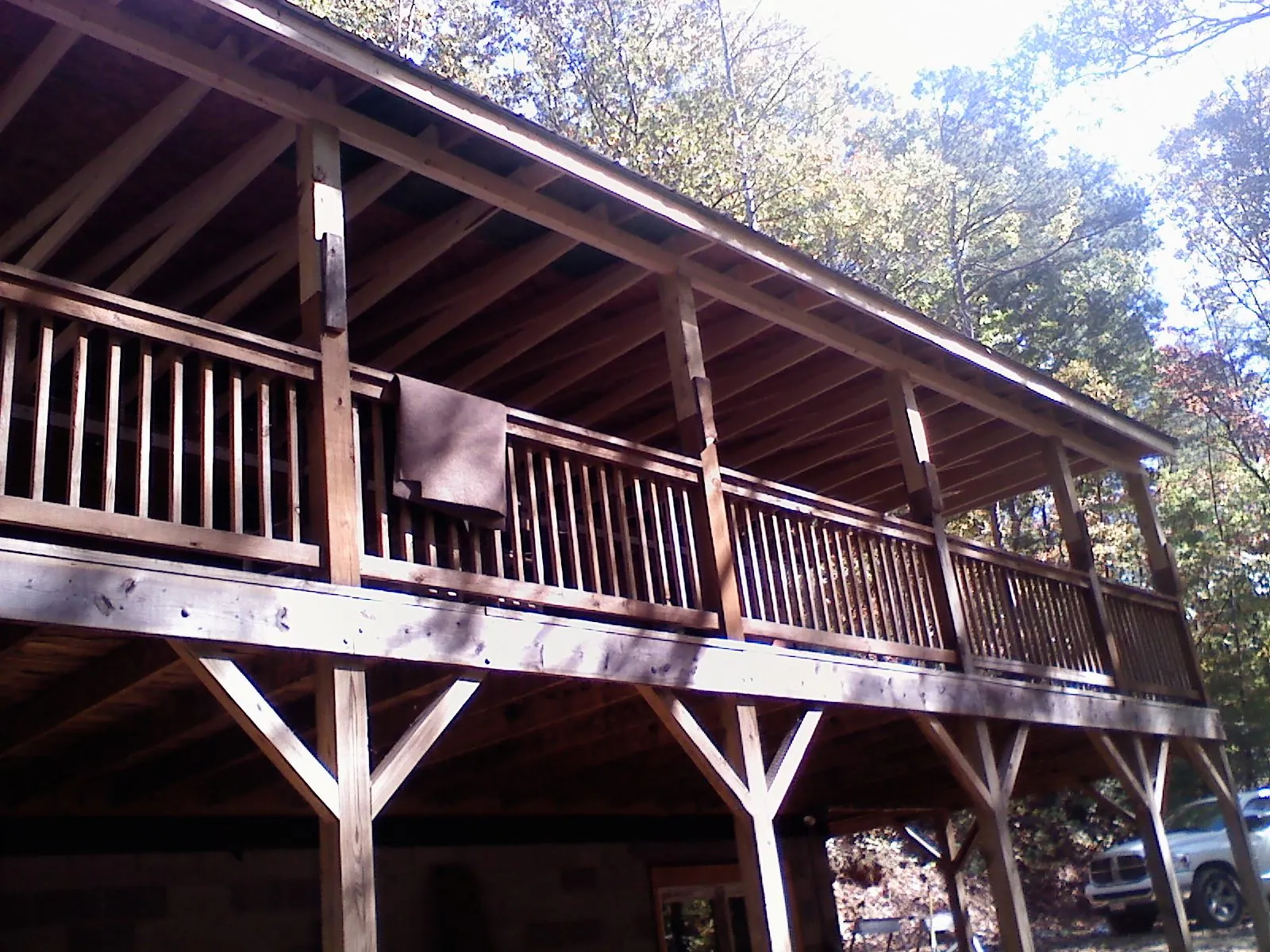 Timber framing under a new elevated porch and deck — Roof Leak Repair in Churchville by Roofing Brothers